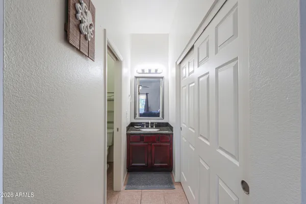 a bathroom with a shower and a shower curtain