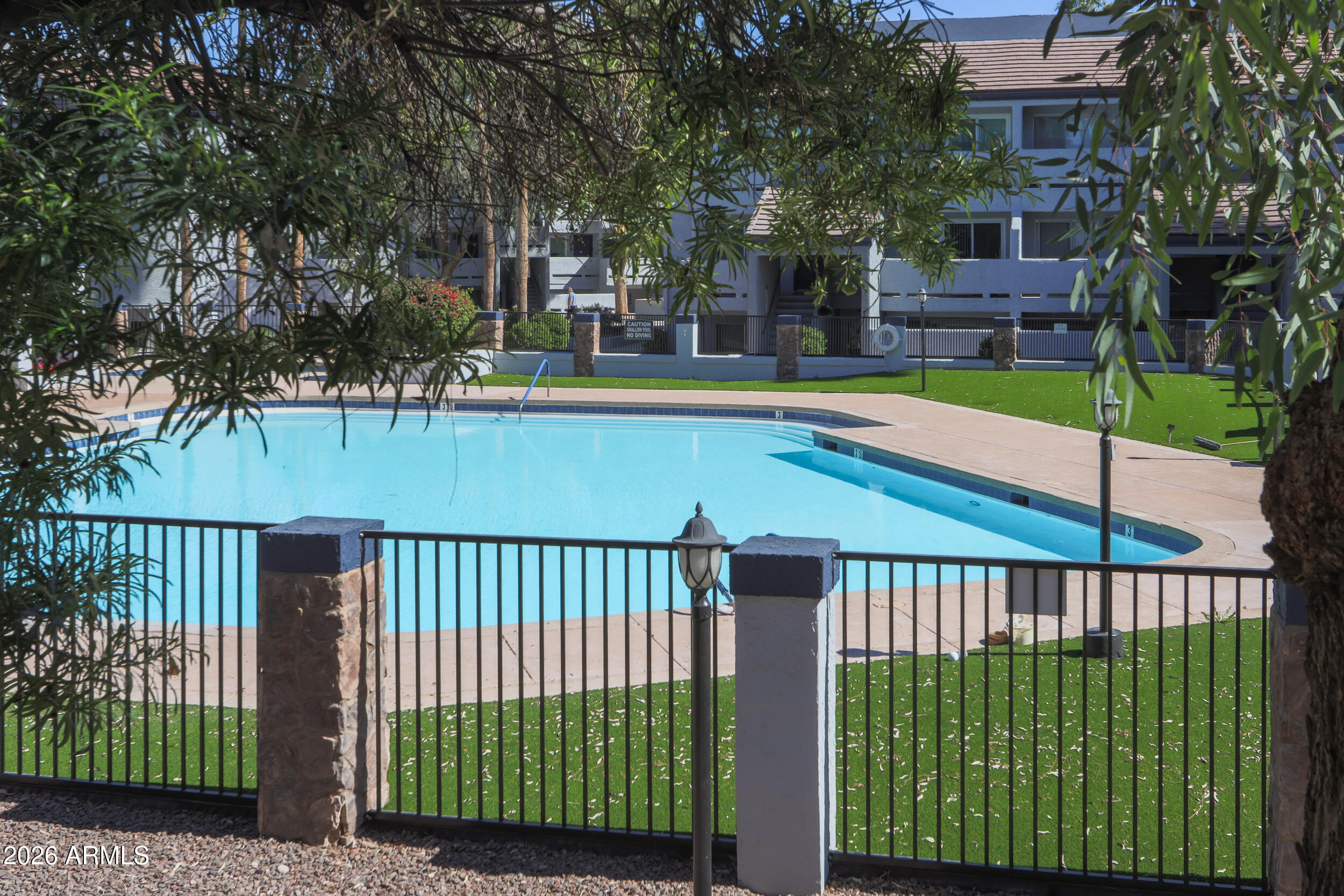 1331 West Baseline Road, Unit 225 Mesa, AZ 85202 - Photo 42 of 47 a balcony with a yard
