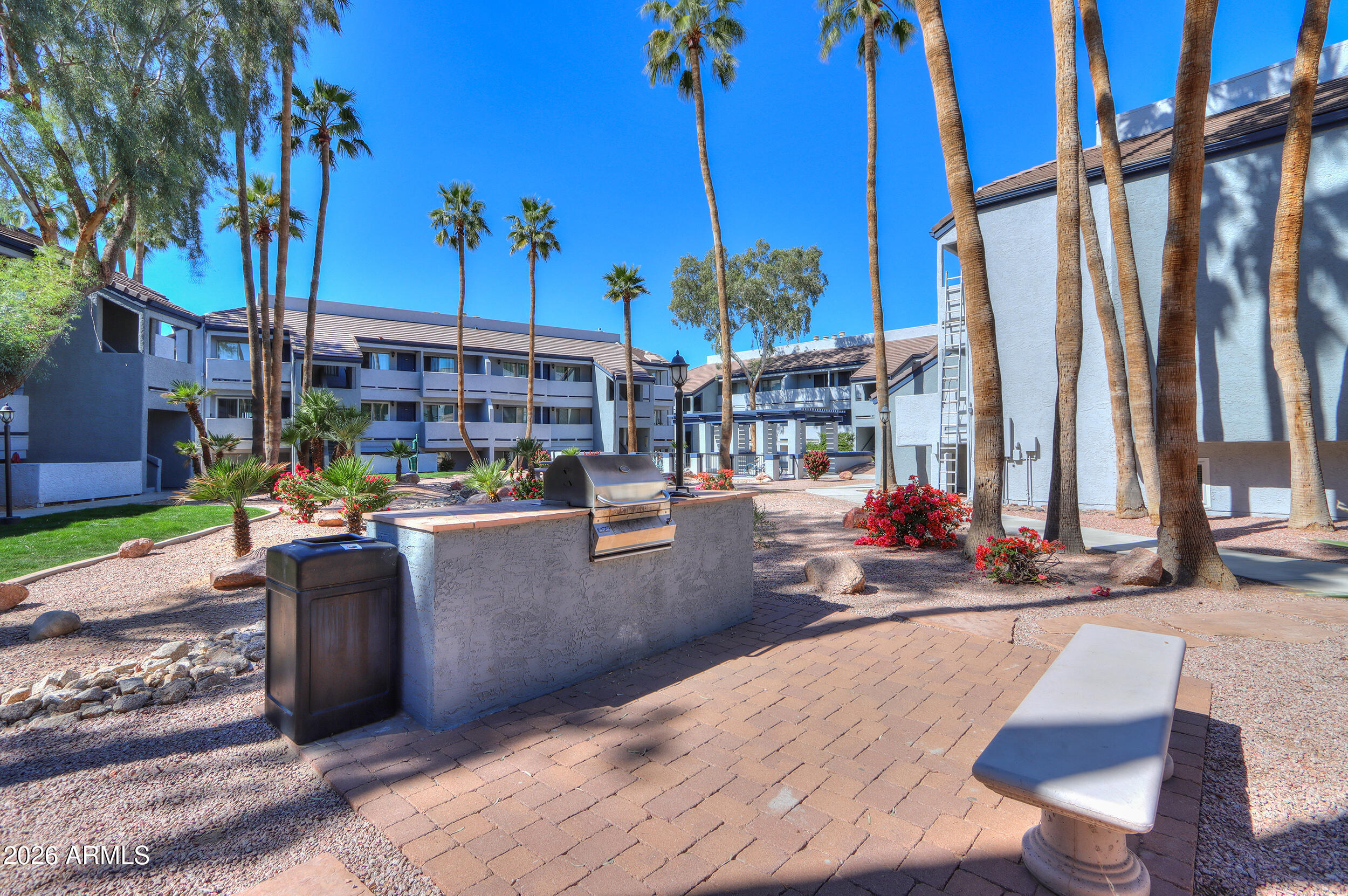1331 West Baseline Road, Unit 225 Mesa, AZ 85202 - Photo 44 of 47 a view of a living room and a patio