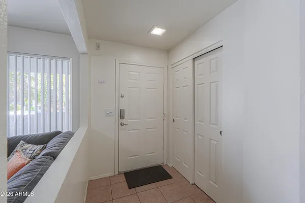 a view of a hallway with a couch