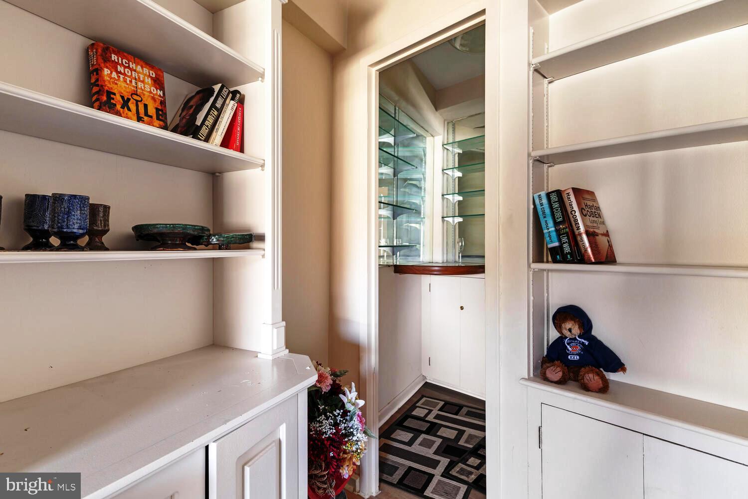 7900 Old York Road, Unit 907A Elkins Park, PA 19027 - Photo 19 of 36 a view of walk in closet with clothes and shoes