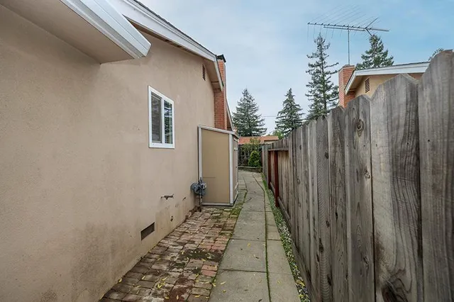 a house view with a backyard
