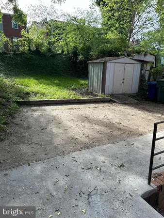 a view of backyard with green space