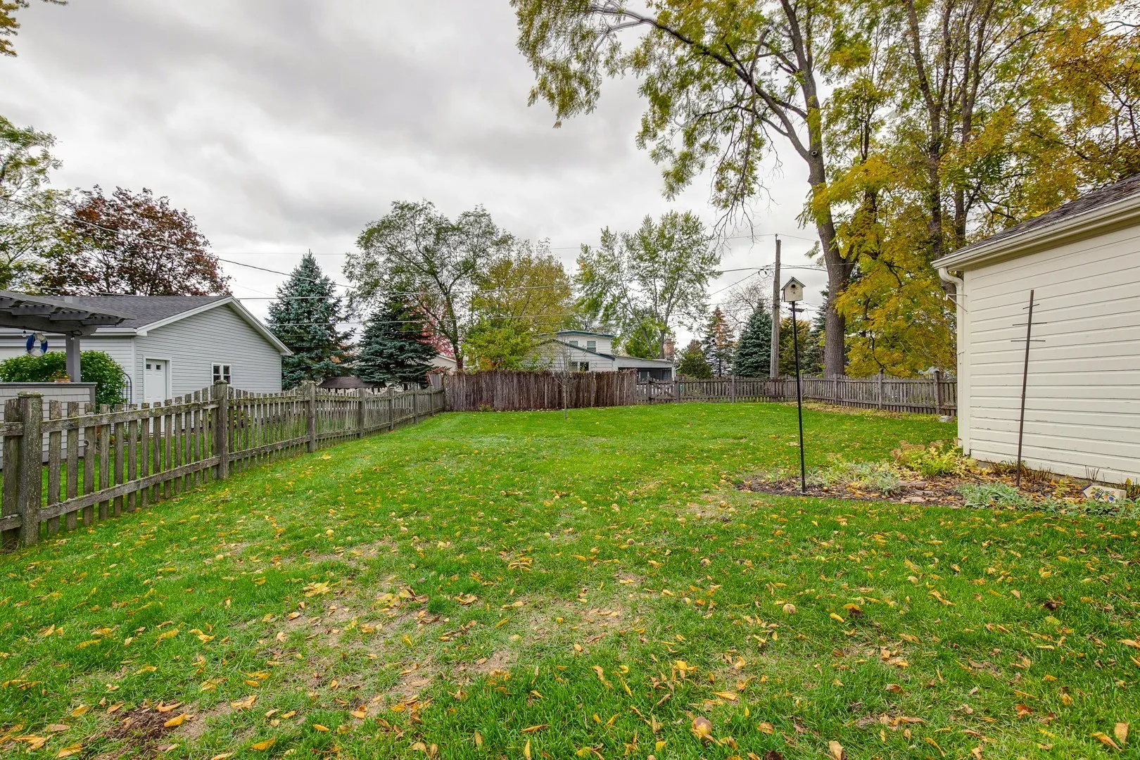 411 Foster Road Wauconda, IL 60084 - Photo 21 of 23 a view of a backyard with a garden