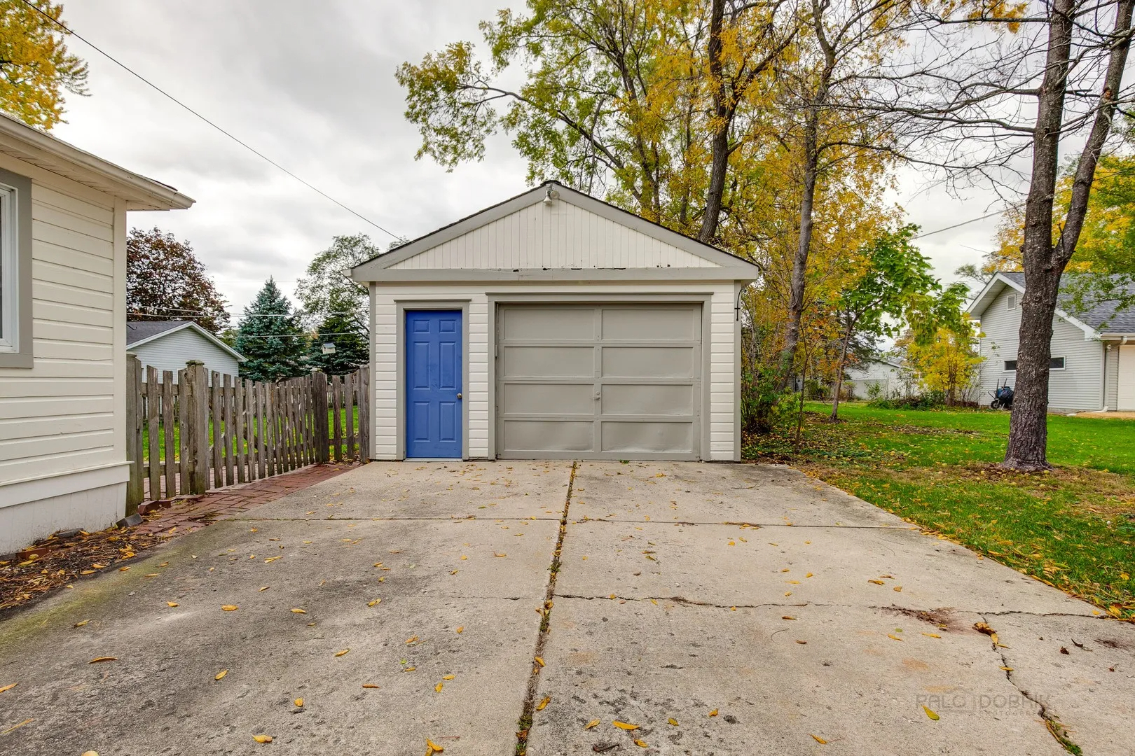 411 Foster Road Wauconda, IL 60084 - Photo 23 of 23 a front view of a house with a yard and garage
