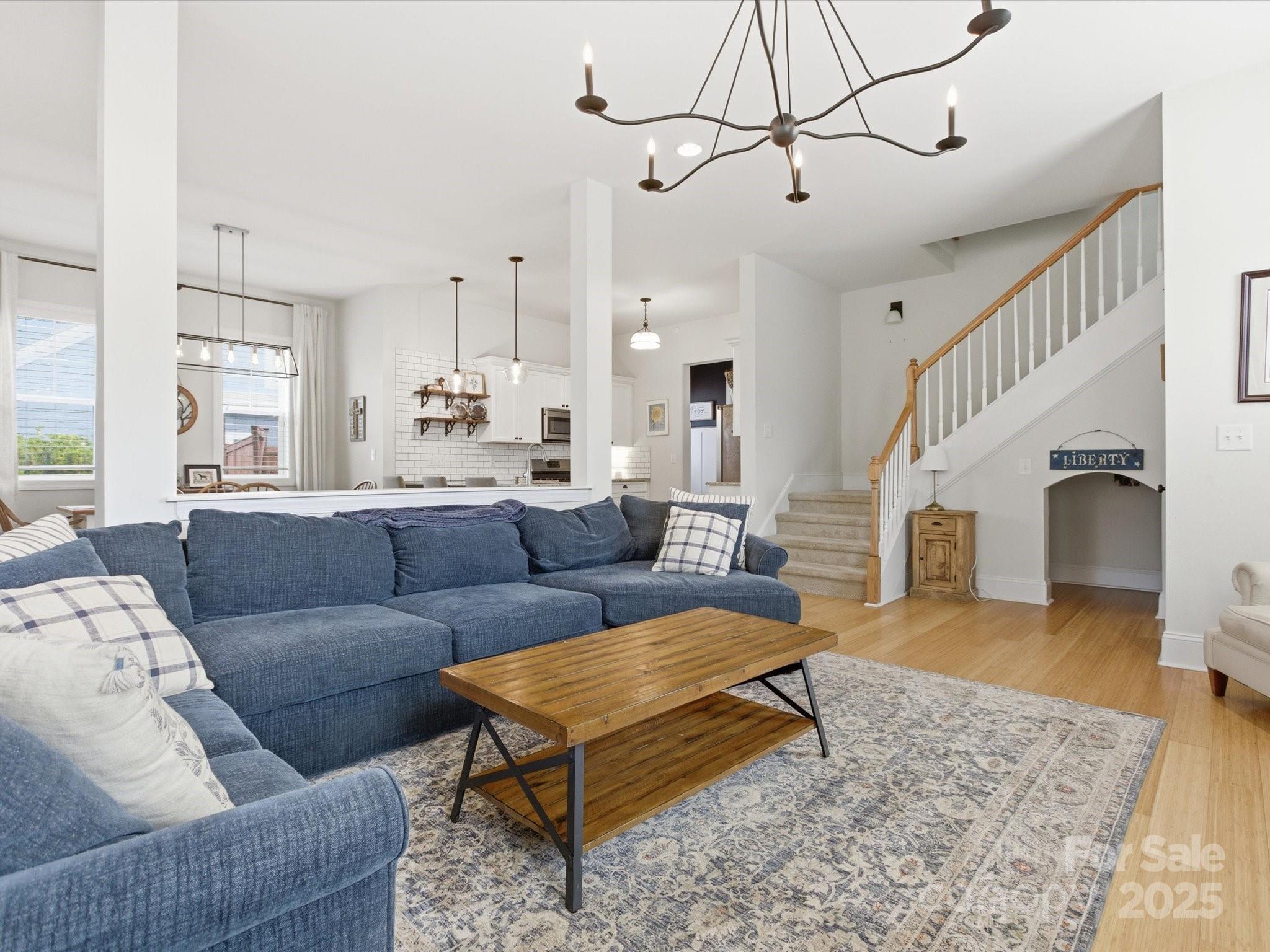 116 Meyers Ridge Road Cramerton, NC 28032 - Photo 12 of 33 a living room with furniture and wooden floor