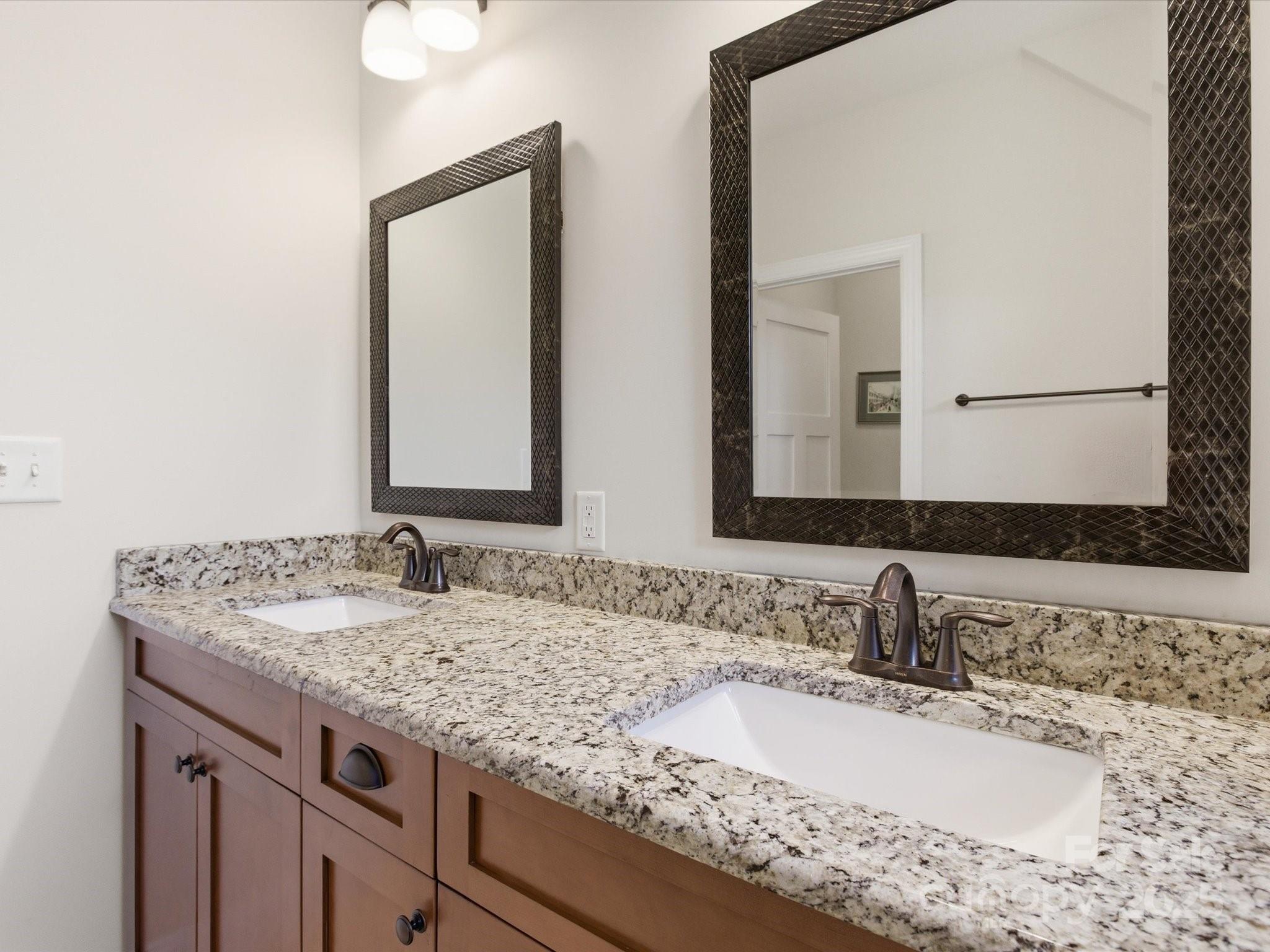 116 Meyers Ridge Road Cramerton, NC 28032 - Photo 24 of 33 a bathroom with a granite countertop sink and a mirror