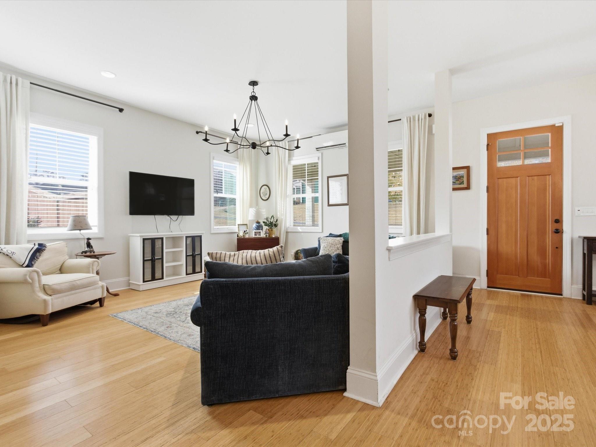 116 Meyers Ridge Road Cramerton, NC 28032 - Photo 5 of 33 a living room with furniture and a flat screen tv