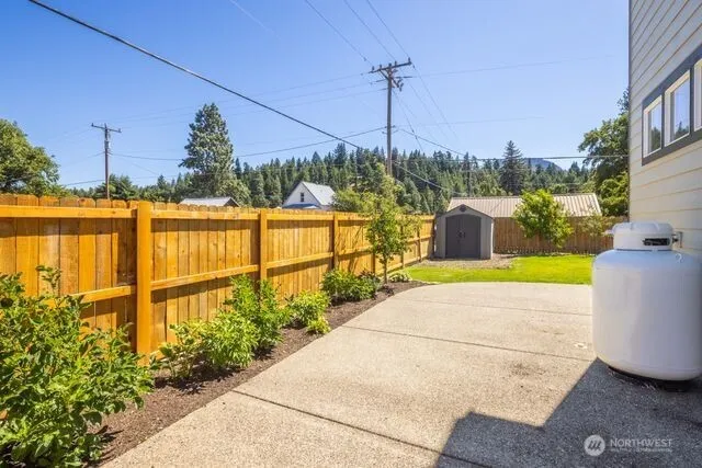 a view of a swimming pool with a patio