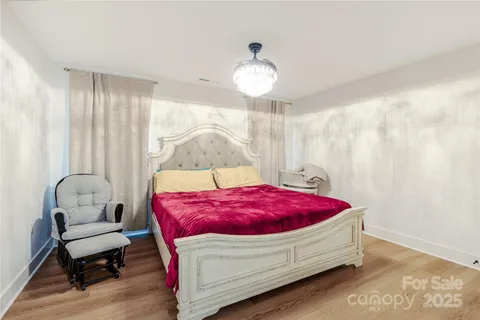 a big house with trees in front of it