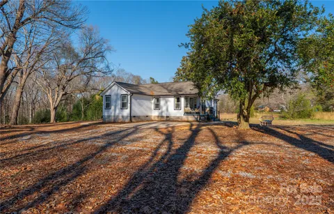 a house view with a backyard space