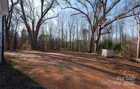 a view of a backyard of a house