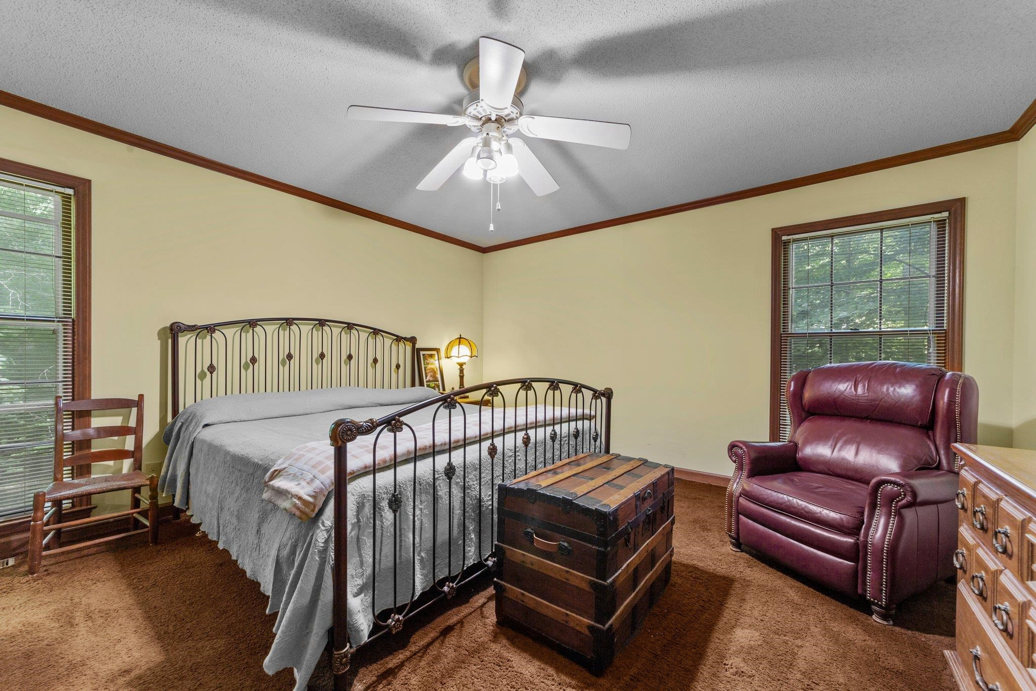 11905 Straight A Way Lane Raleigh, NC 27613 - Photo 27 of 37 a bedroom with furniture and a chandelier