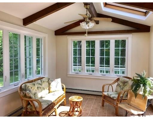 201 Beaman Road Sterling, MA 01564 - Photo 14 of 38 a living room with furniture and floor to ceiling windows