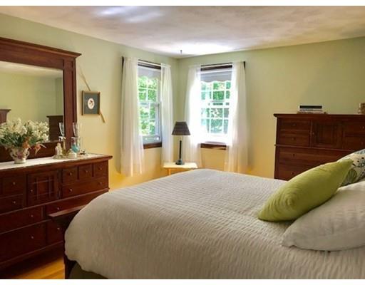 201 Beaman Road Sterling, MA 01564 - Photo 17 of 38 a bedroom with a bed and a dresser