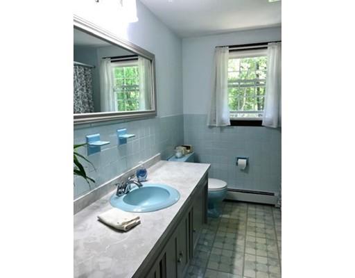 201 Beaman Road Sterling, MA 01564 - Photo 23 of 38 a bathroom with a sink and a mirror