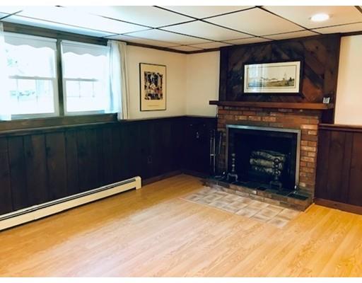 201 Beaman Road Sterling, MA 01564 - Photo 26 of 38 a view of an empty room with a fireplace