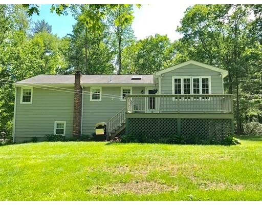 201 Beaman Road Sterling, MA 01564 - Photo 3 of 38 a front view of a house with a yard