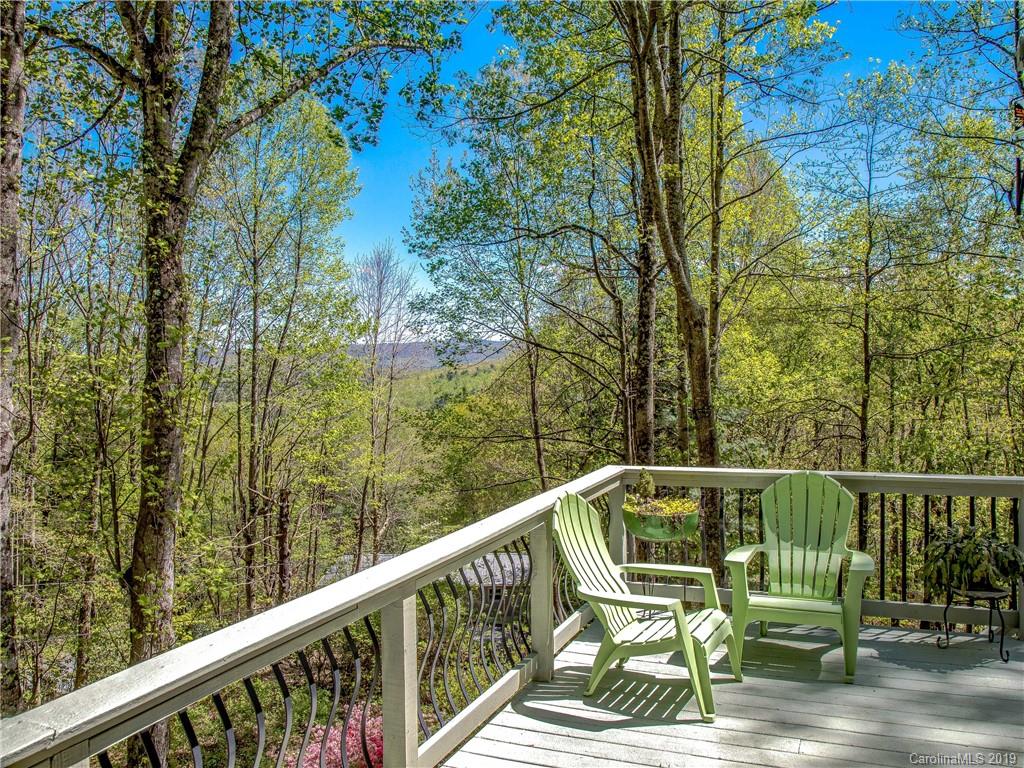 17 Finlay Ridge Road Hendersonville, NC 28739 - Photo 12 of 32 a view of balcony with furniture and trees