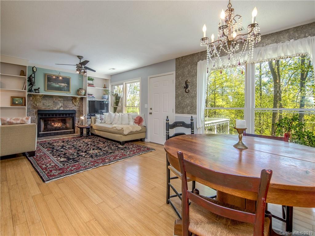 17 Finlay Ridge Road Hendersonville, NC 28739 - Photo 7 of 32 a living room with furniture and a fireplace