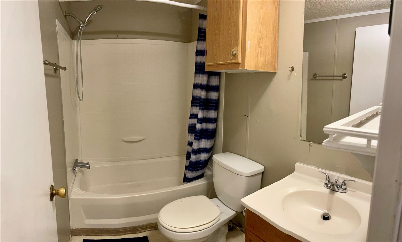 424 32 Road, Unit 335 Clifton, CO 81520 - Photo 16 of 18 a bathroom with a sink toilet and shower