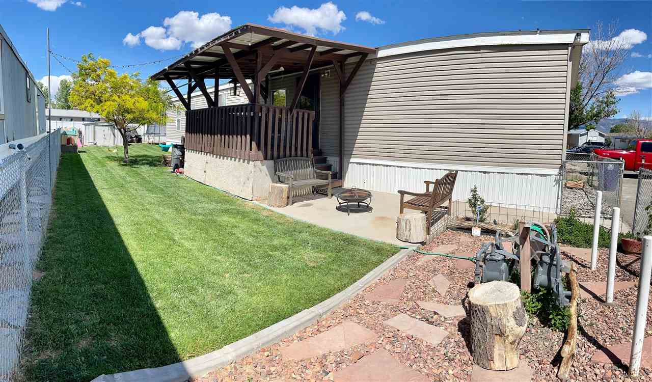 424 32 Road, Unit 335 Clifton, CO 81520 - Photo 8 of 18 a view of a porch with furniture and a yard
