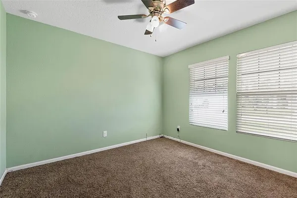 a view of a room that has a window in it