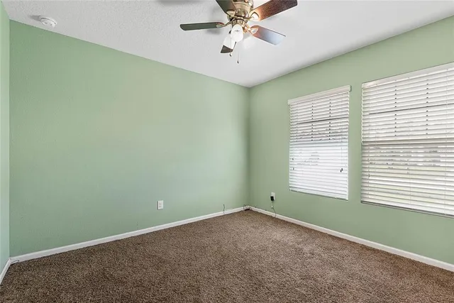 a view of a room that has a window in it