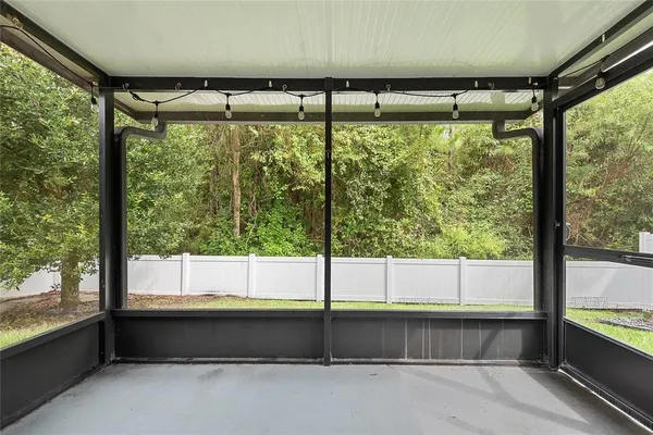 a view of a large window with an outdoor view