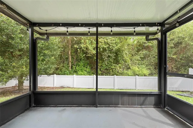 a view of a large window with an outdoor view