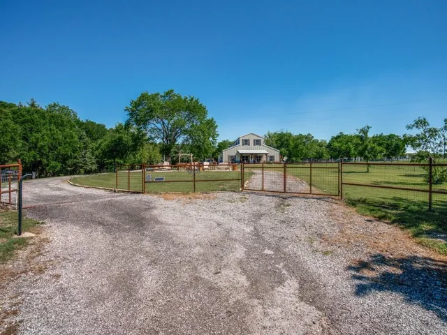 a view of outdoor space with deck and yard
