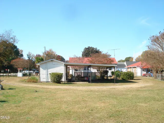 a view of a balcony with chairs