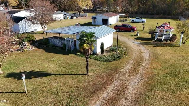 a front view of a house with swimming pool