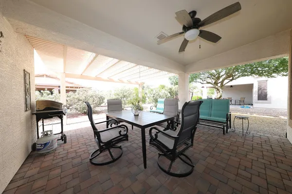 a view of a dining room with furniture window and outside view