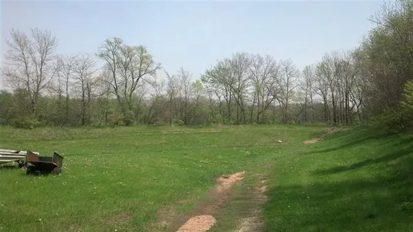 a view of a golf course with a lake