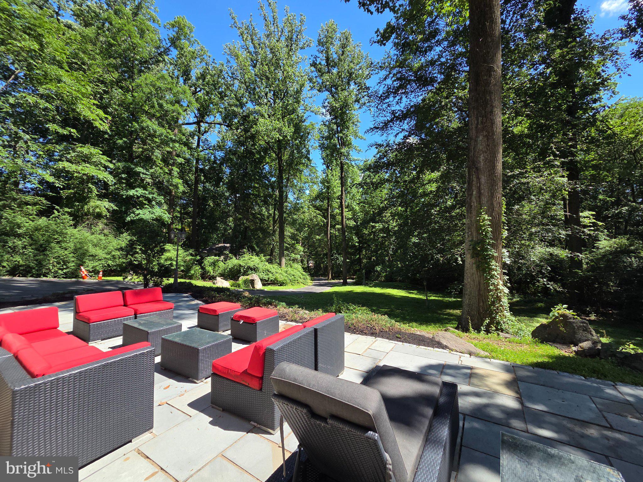 756 Campwoods Road Villanova, PA 19085 - Photo 5 of 38 Serene outdoor retreat in lush greenery.