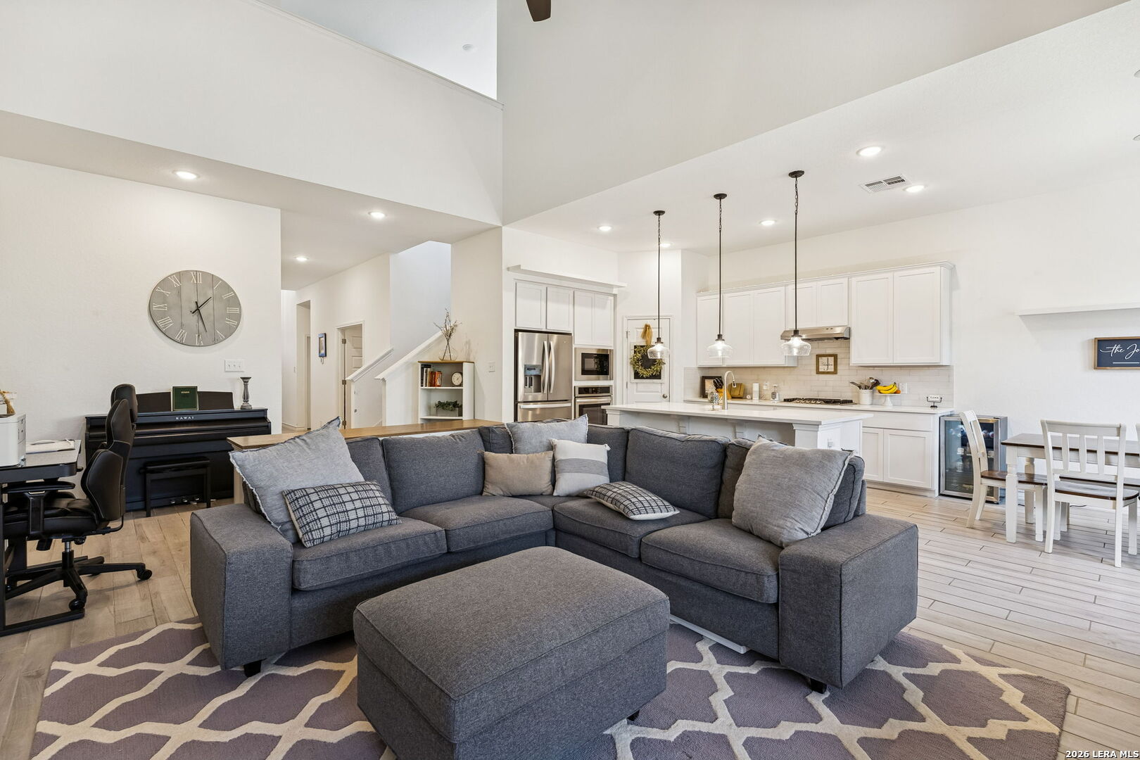 12260 Buckaroo Ranch San Antonio, TX 78254 - Photo 11 of 45 a living room filled with furniture and kitchen view
