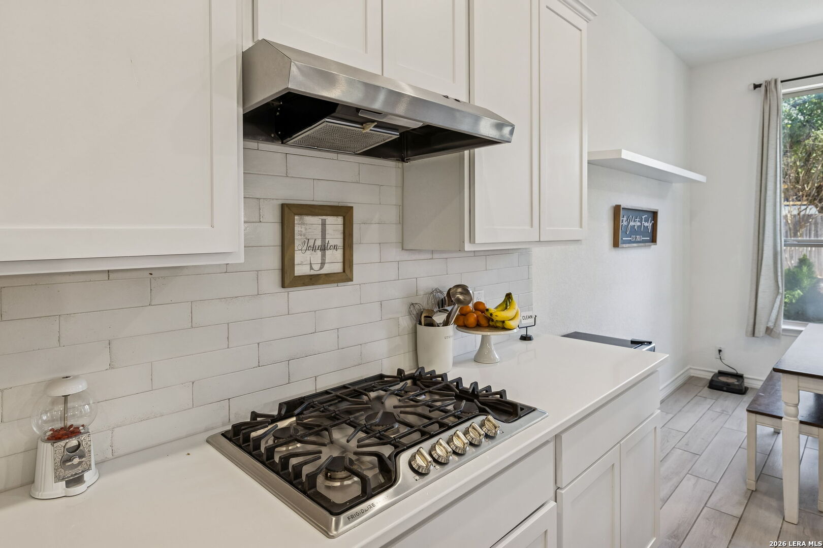 12260 Buckaroo Ranch San Antonio, TX 78254 - Photo 18 of 45 a kitchen with a stove and a sink