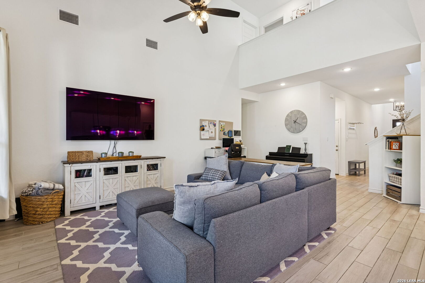 12260 Buckaroo Ranch San Antonio, TX 78254 - Photo 10 of 45 a living room with furniture and a flat screen tv