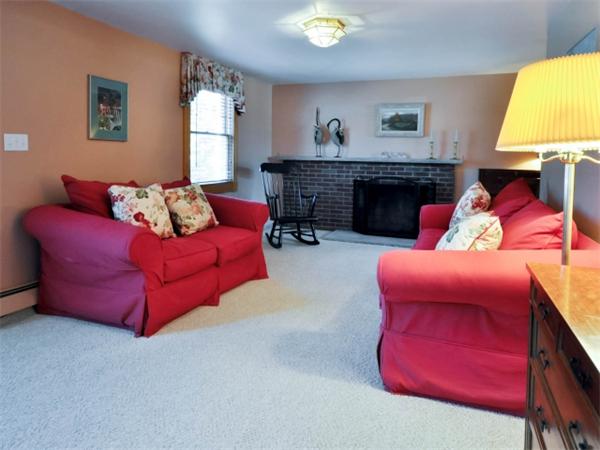 21 Appleton Road Natick, MA 01760 - Photo 4 of 25 a living room with furniture and a fireplace