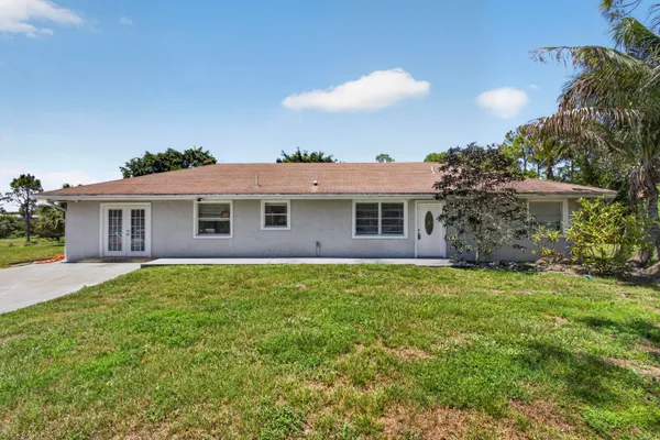 $550,000 | 16663 89th Place North, The Acreage, FL 33470