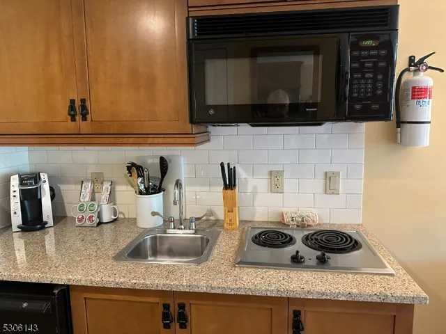 a bed room with a bed and furniture