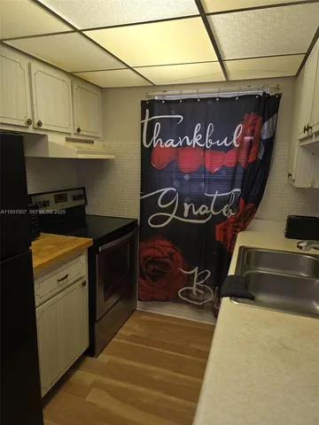 a room with storage and a white door