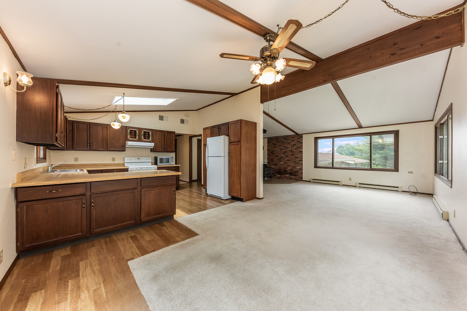 44W695 Scott Road Sugar Grove, IL 60554 - Photo 13 of 34 a large room with a large window and chandelier