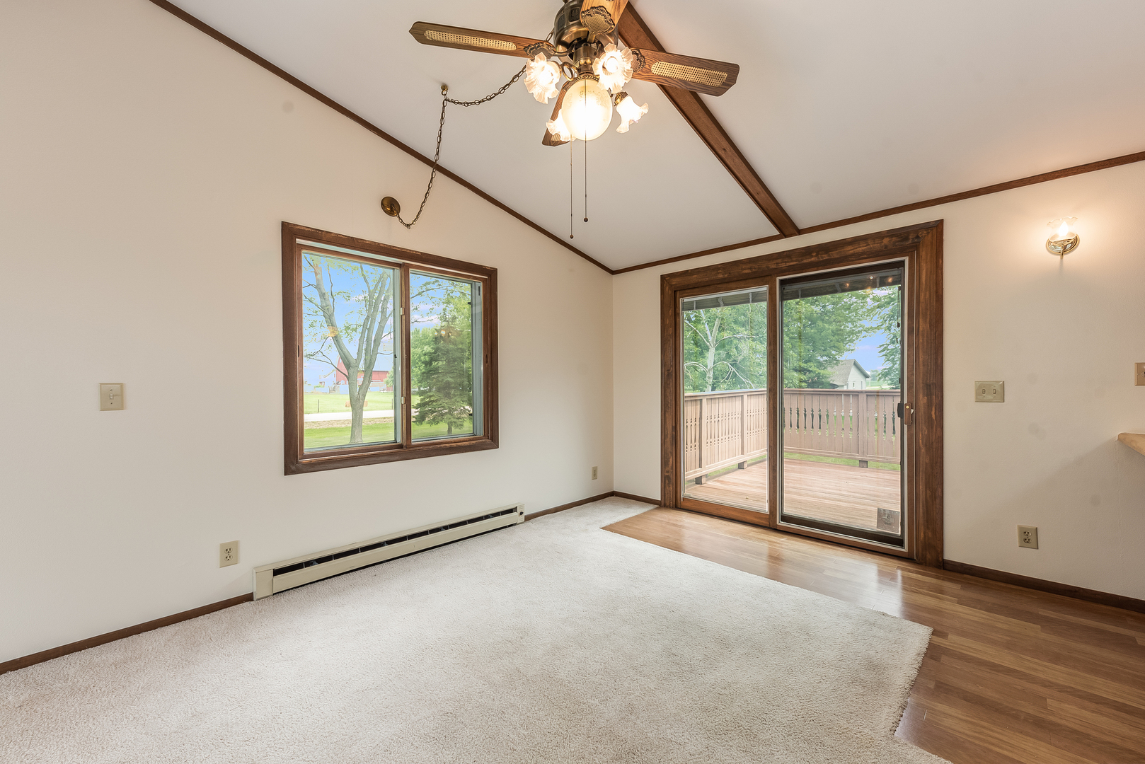 44W695 Scott Road Sugar Grove, IL 60554 - Photo 16 of 34 a view of a livingroom with a ceiling fan and window