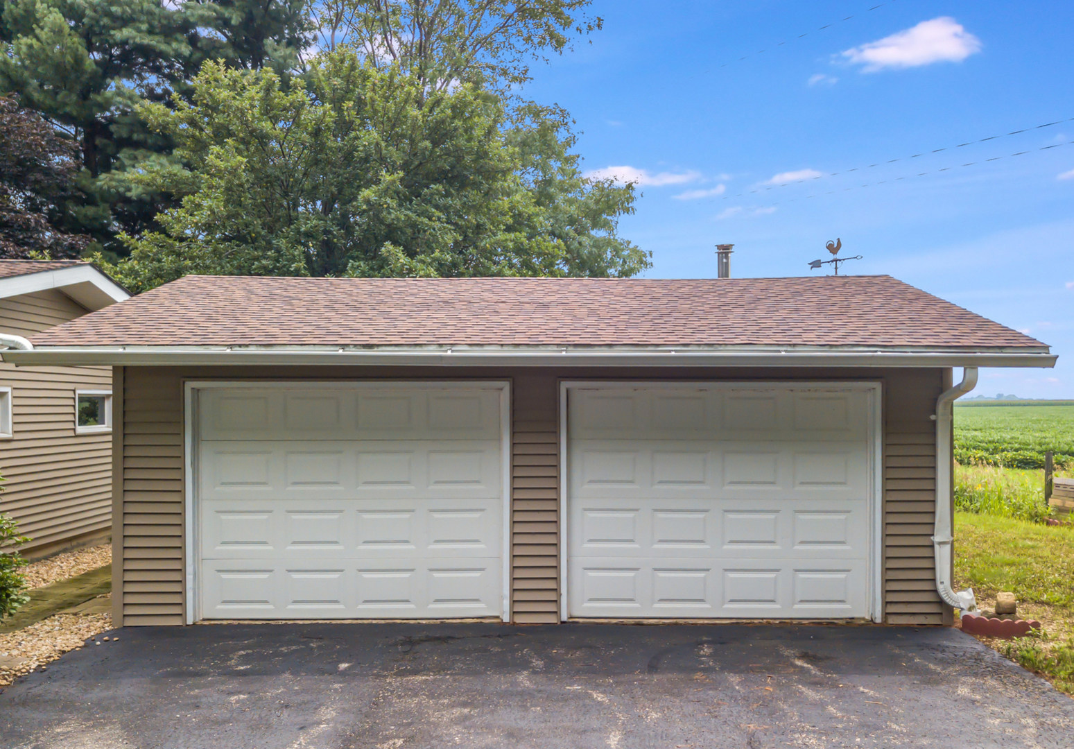 44W695 Scott Road Sugar Grove, IL 60554 - Photo 10 of 34 a backyard of a house with a garage
