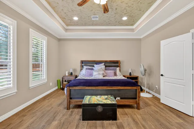 a bed room with a bed and window