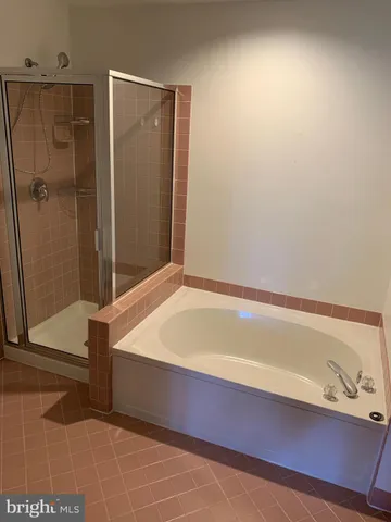 an entryway with a white walls