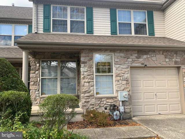 a house view with a outdoor space