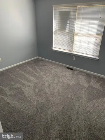 a view of a livingroom with wooden floor